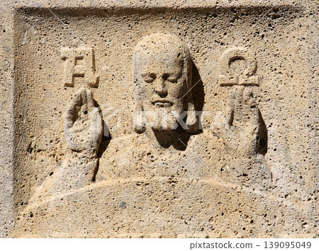 Jesus alpha and omega headstone on Mirogoj cemetery in Zagreb, Croatia Jesus alpha and omega headstone on Mirogoj cemetery in Zagreb, Croatia 139095049