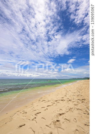 The refreshing ocean view of Ishigaki Island, with its white sand and emerald sea. The refreshing ocean view of Ishigaki Island, with its white sand and emerald sea. 139095067