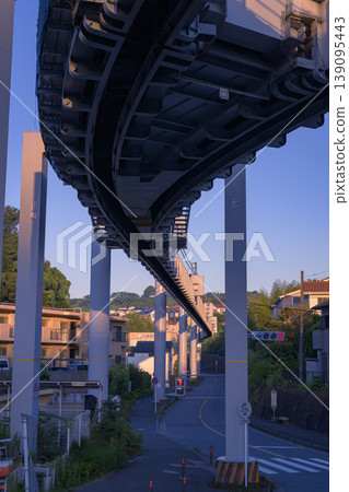 The scenery of Nishi-Kamakura Station and the Shonan Monorail bathed in the early morning light. The scenery of Nishi-Kamakura Station and the Shonan Monorail bathed in the early morning light. 139095443