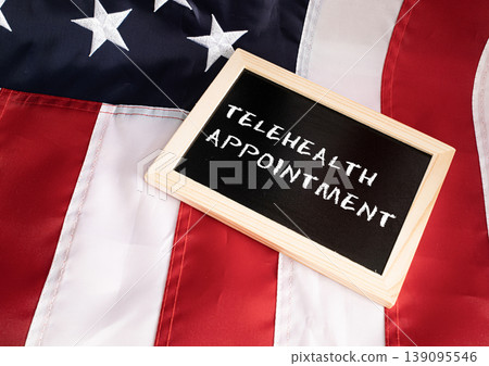 Telehealth Appointment chalkboard sign on American flag background, telemedicine healthcare digital medicine concept Telehealth Appointment chalkboard sign on American flag background, telemedicine healthcare digital medicine concept 139095546