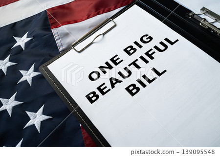 One Big Beautiful Bill text on clipboard paper concept of US federal legislation budget policy document 139095548