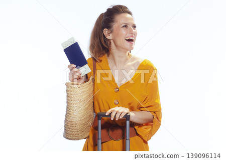 Happy Woman Traveler Holding Passport and Boarding Pass Happy Woman Traveler Holding Passport and Boarding Pass 139096114