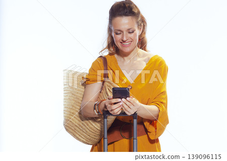 Woman Traveler Looking at Smartphone during Trip Planning Woman Traveler Looking at Smartphone during Trip Planning 139096115