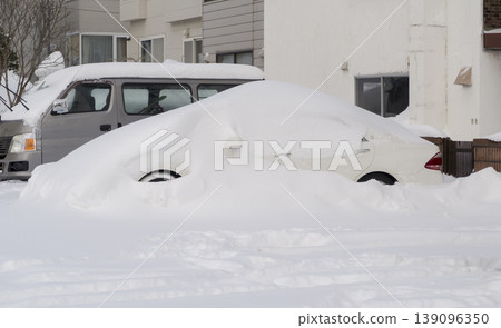 Cars buried in snow Cars buried in snow 139096350