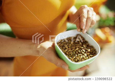 Mindful Snacking of Nutrient Rich Pumpkin Seeds Mindful Snacking of Nutrient Rich Pumpkin Seeds 139096522