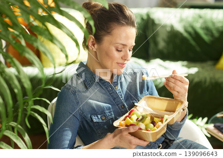 Calm Moment of Mindful Eating with Fresh Fruit Salad Calm Moment of Mindful Eating with Fresh Fruit Salad 139096643