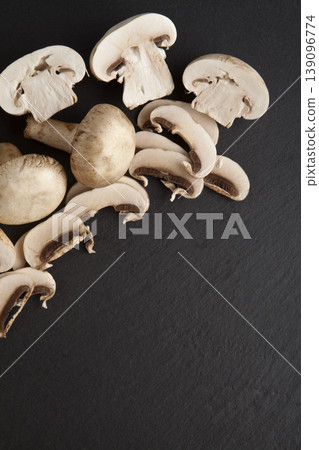Organic Mushrooms on Gray Granite Table. Natural Mushrooms on Granite Texture Background. Organic Mushrooms on Gray Granite Table. Natural Mushrooms on Granite Texture Background. 139096774