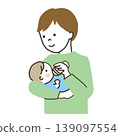 Father giving milk 139097554