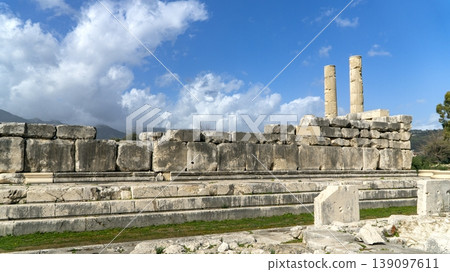 Ruins of the Letoon Temple with standing Ionic columns and massive stone walls, a UNESCO-listed Lycian sanctuary, historic Lycian ruins near city of Xanthos, Mugla, Turkey Ruins of the Letoon Temple with standing Ionic columns and massive stone walls, a UNESCO-listed Lycian sanctuary, historic Lycian ruins near city of Xanthos, Mugla, Turkey 139097611