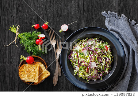 Fresh cabbage and radish coleslaw in a bowl 139097828