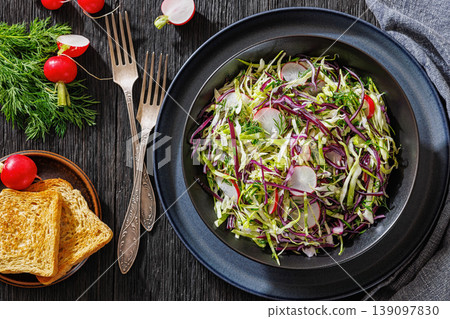 Fresh cabbage and radish coleslaw in a bowl Fresh cabbage and radish coleslaw in a bowl 139097830