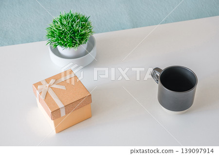decorative flower gift box and mug on the table decorative flower gift box and mug on the table 139097914