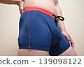 Fat man who pinches her stomach luxury 139098122