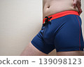 Fat man who pinches her stomach luxury 139098123