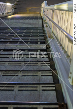 City night view background material: Overhead shot of pedestrian overpass stairs. City night view background material: Overhead shot of pedestrian overpass stairs. 139098361