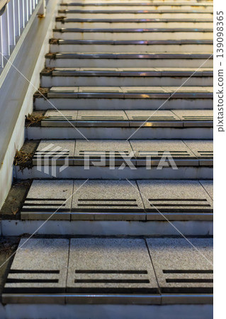 City night view background material: Overhead shot of pedestrian overpass stairs. City night view background material: Overhead shot of pedestrian overpass stairs. 139098365