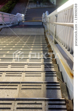 City night view background material: Overhead shot of pedestrian overpass stairs. 139098369