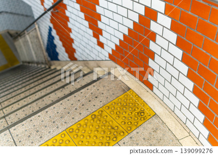 Background material of station stairs and tactile paving for the visually impaired. Background material of station stairs and tactile paving for the visually impaired. 139099276