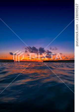 The sea and sky of Inoda Fishing Port are bathed in the morning light, creating a beautiful early morning scene. The sea and sky of Inoda Fishing Port are bathed in the morning light, creating a beautiful early morning scene. 139099327