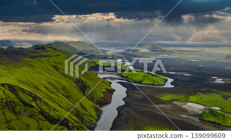 Aerial View of Iceland's Volcanic Landscape with River and Mossy Hills Aerial View of Iceland's Volcanic Landscape with River and Mossy Hills 139099609