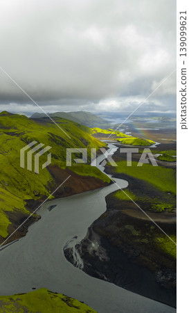 Aerial View of Winding River in Moss Covered Volcanic Landscape, Iceland 139099621