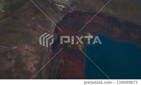 Aerial View of Volcanic Landscape with Blue Lake in Iceland Aerial View of Volcanic Landscape with Blue Lake in Iceland 139099673