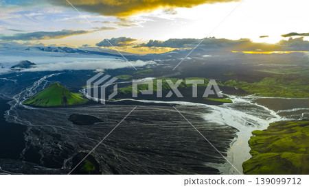 Aerial View of Volcanic Hill, Rivers, and Snow Capped Mountains in Iceland Aerial View of Volcanic Hill, Rivers, and Snow Capped Mountains in Iceland 139099712