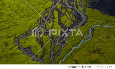 Aerial View of Braided River System in Iceland's Moss Covered Terrain 139099736