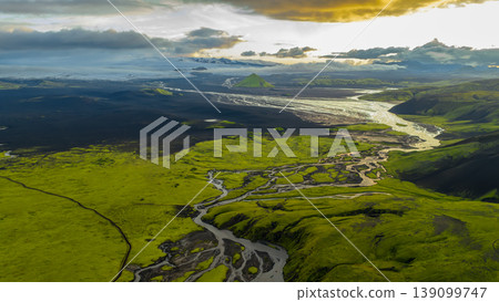 Aerial View of Iceland's Mossy Terrain, Rivers, and Triangular Mountain 139099747