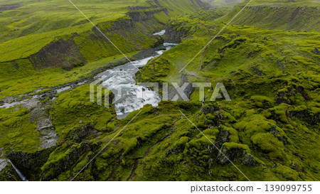 Aerial View of Moss Covered Canyon with River and Waterfall in Iceland 139099755