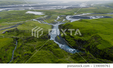 Aerial View of Icelandic Gorge, River, and Black Sand Plain Aerial View of Icelandic Gorge, River, and Black Sand Plain 139099761