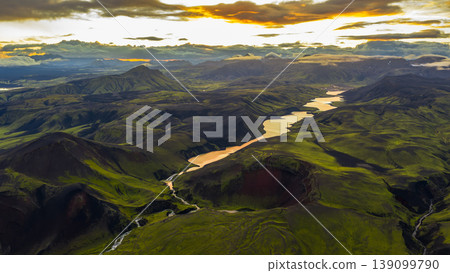 Aerial View of Iceland's Volcanic Landscape with River at Sunset Aerial View of Iceland's Volcanic Landscape with River at Sunset 139099790