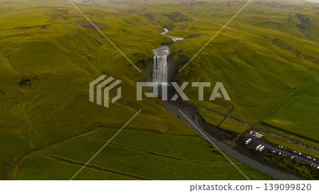 Aerial View of Skogafoss Waterfall and Surrounding Green Hills in Iceland Aerial View of Skogafoss Waterfall and Surrounding Green Hills in Iceland 139099820