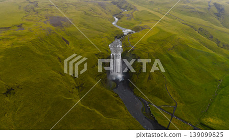 Aerial View of Skogafoss Waterfall and Surrounding Green Hills in Iceland Aerial View of Skogafoss Waterfall and Surrounding Green Hills in Iceland 139099825