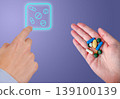 Hands show pills capsules medicine vitamins supplements beside neon icon on blue medical health background. Pharmacy scene for dosage planning, treatment routine, wellness tracking and medication use. 139100139