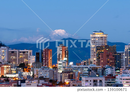 Quito skyline at sunset with the Cayambe volcano in the background. Quito skyline at sunset with the Cayambe volcano in the background. 139100671
