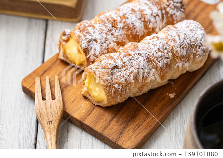 Cornet on a wooden plate Cornet on a wooden plate 139101080