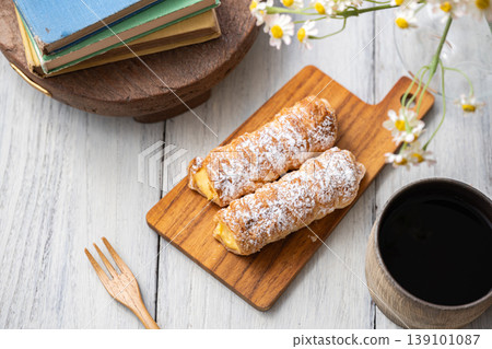 Cornet on a wooden plate Cornet on a wooden plate 139101087