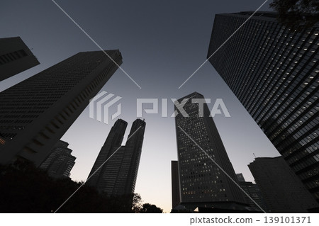 Looking up at skyscrapers Looking up at skyscrapers 139101371