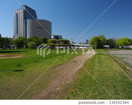 Naniwa Palace Site Park with its winding paths and urban landscape Naniwa Palace Site Park with its winding paths and urban landscape 139102164