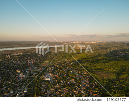 Panorama Countryside River Estuary At Dusk, Aerial Overview Of Expanding Settlements And Patchwork Farmland, Greenbelt And Marsh Edges Visible, Planner Survey Perspective For Development Panorama Countryside River Estuary At Dusk, Aerial Overview Of Expanding Settlements And Patchwork Farmland, Greenbelt And Marsh Edges Visible, Planner Survey Perspective For Development 139102577