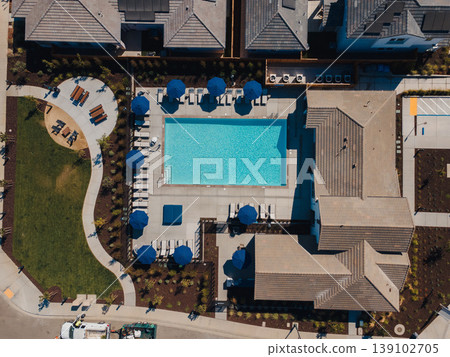 Top Down Symmetry Of Courtyard Pool Clean Modern Architecture With Geometric Tiles, Shaded Seating And Crisp Shadows, Sharply Defined Rooflines And Minimalist Luxury Vibe, Strong Design Top Down Symmetry Of Courtyard Pool Clean Modern Architecture With Geometric Tiles, Shaded Seating And Crisp Shadows, Sharply Defined Rooflines And Minimalist Luxury Vibe, Strong Design 139102705