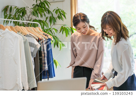 Apparel Business woman meeting with color samples Apparel Business woman meeting with color samples 139103243