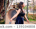 Detail of a musical instrument, bass drum and cymbals belonging to a chinchinera, a female street musician who dances and plays her drum in the streets. Chilean heritage, Chilean culture, national 139104808