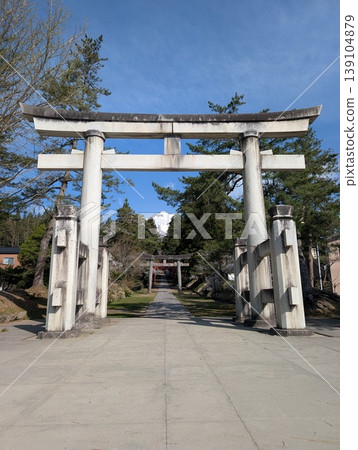 The large torii gate of a Shinto shrine: an image of traditional Japanese culture and historical architecture. The large torii gate of a Shinto shrine: an image of traditional Japanese culture and historical architecture. 139104879