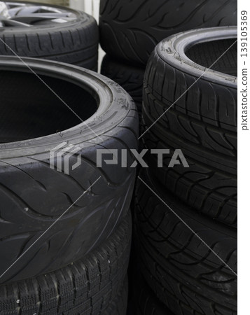 A scene of used tires collected as industrial waste. A scene of used tires collected as industrial waste. 139105369