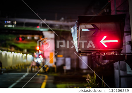 Level crossing guide lights under the elevated railway Level crossing guide lights under the elevated railway 139106289