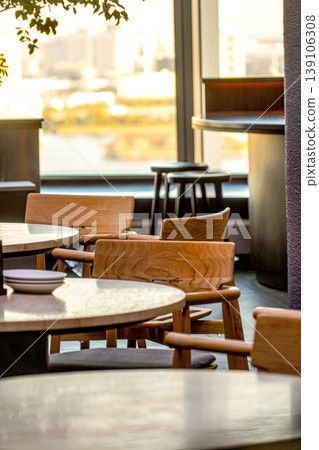 Cafe seating by the window Cafe seating by the window 139106308