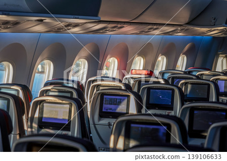 Seat rows inside a passenger aircraft 139106633
