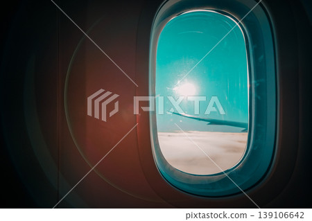 Light from the airplane window and the shadow of the wing Light from the airplane window and the shadow of the wing 139106642